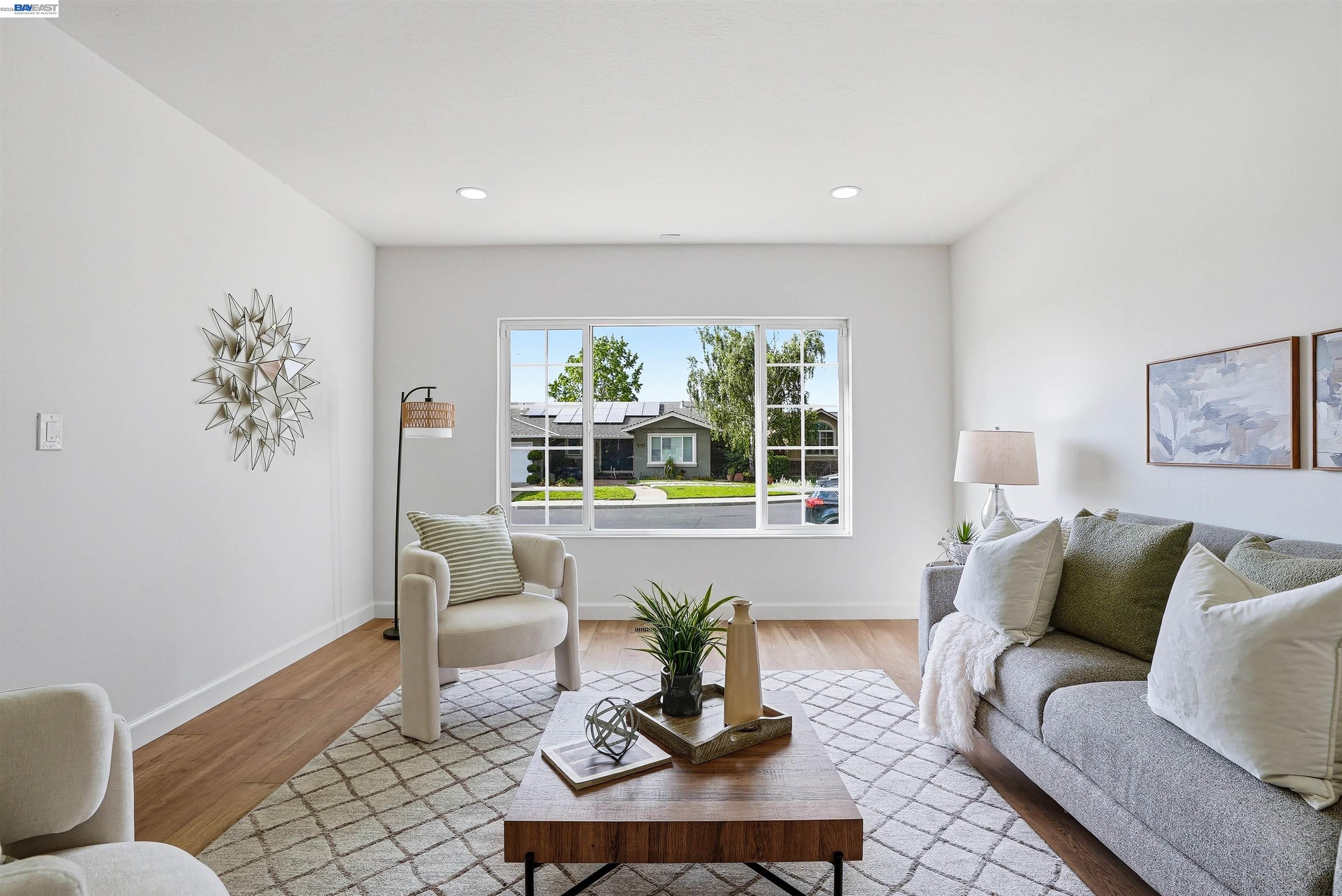 6738 Rancho Court Pleasanton, CA 94588 - Photo 6 of 33 a living room with furniture and a large window