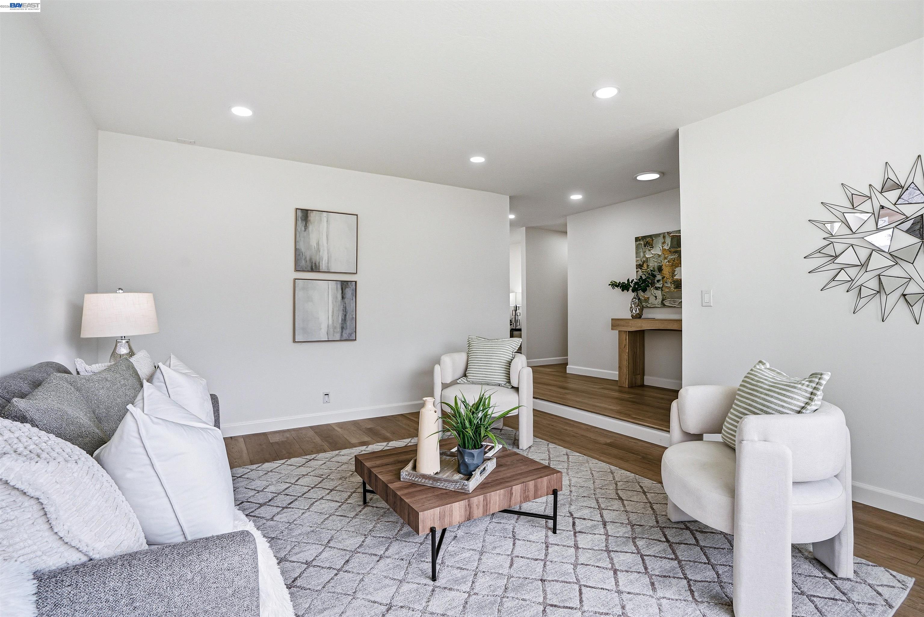 6738 Rancho Court Pleasanton, CA 94588 - Photo 7 of 33 a living room with furniture and wooden floor
