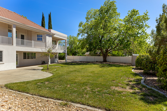 389 North Main Street St. George, UT 84770 - Photo 5 of 44 Fenced backyard with a patio and a balcony