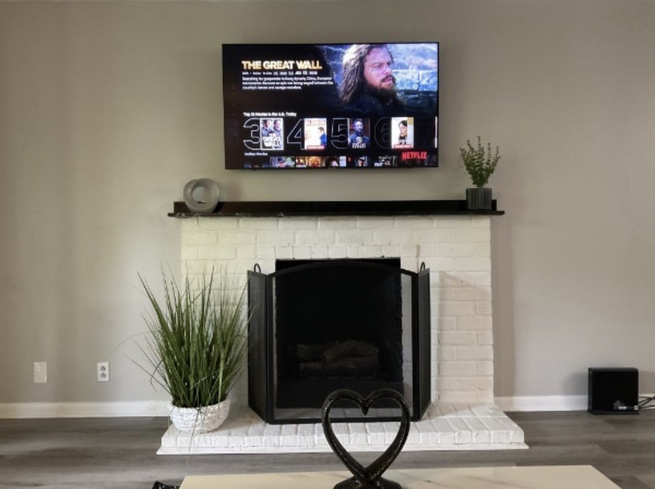 2116 Hobbs Road, Unit M5 Nashville, TN 37215 - Photo 4 of 18 a living room with a fireplace and a potted plant