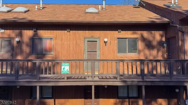 a kitchen with a table and chairs