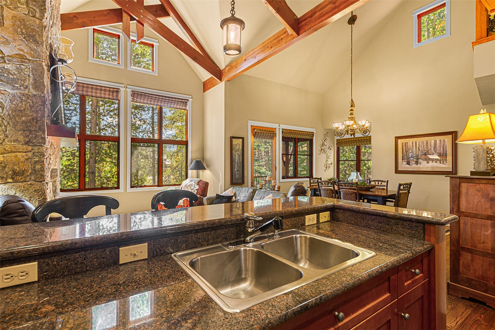 55 Westridge Road, Unit 55 Breckenridge, CO 80424 - Photo 11 of 42 a kitchen sink with granite countertop a sink and a counter top space
