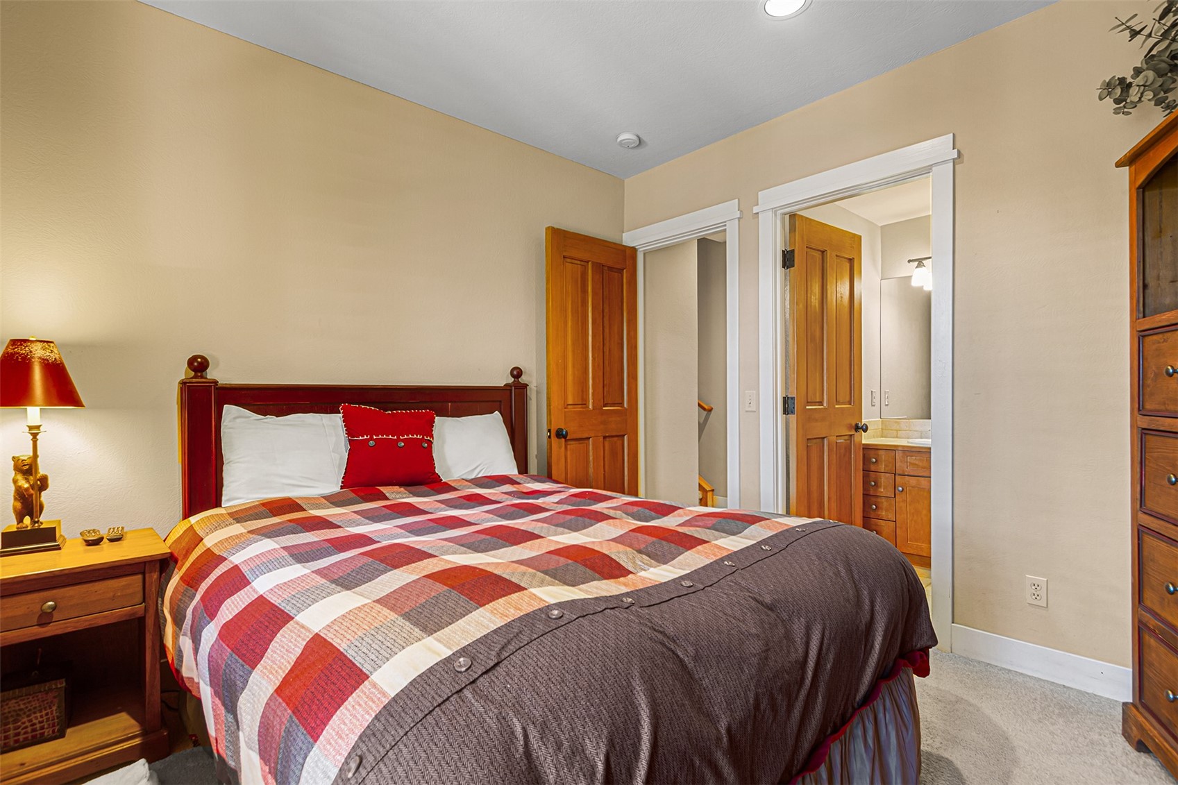 55 Westridge Road, Unit 55 Breckenridge, CO 80424 - Photo 30 of 42 a bedroom with a bed and a closet