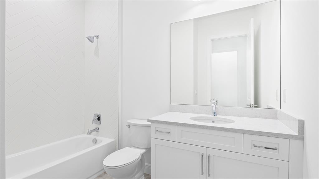 5237 Rivo Alto Circle Westlake, FL 33470 - Photo 33 of 63 a bathroom with a sink a toilet and a bathtub