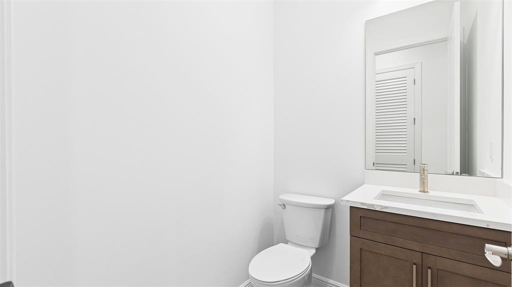 5237 Rivo Alto Circle Westlake, FL 33470 - Photo 34 of 63 a bathroom with a sink and a toilet