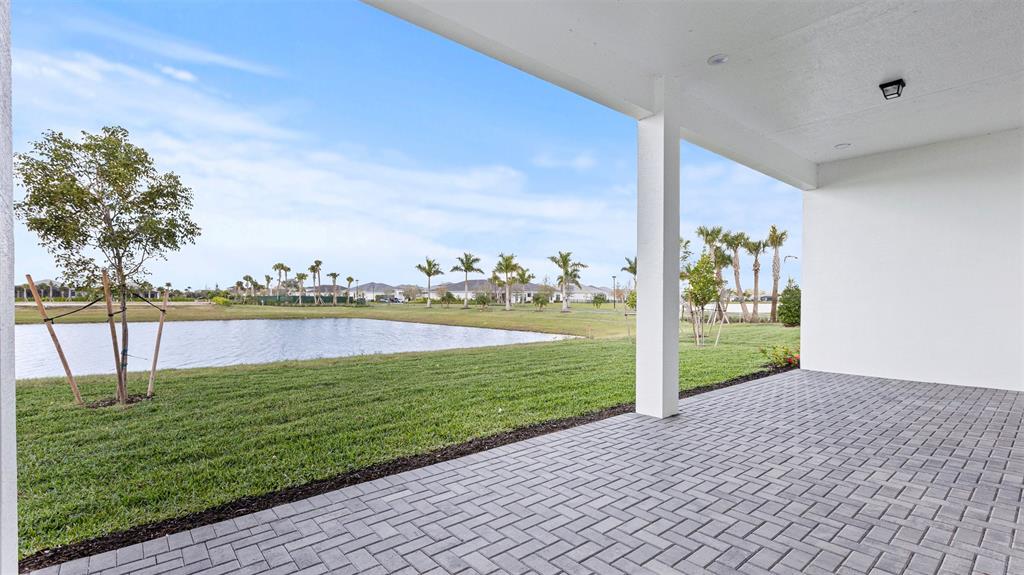 5237 Rivo Alto Circle Westlake, FL 33470 - Photo 40 of 63 a view of a water fountain and a yard