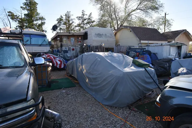 a car parked in front of a house