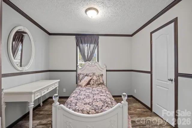 a spacious bathroom with a sink a mirror and a bathtub