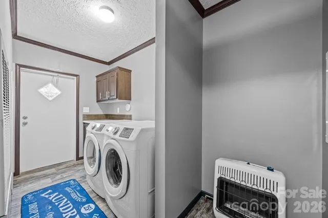 a wooden building with trees in front of it