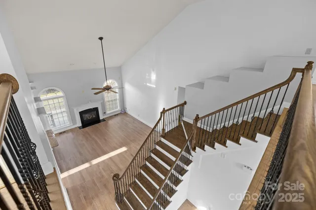 a view of an entryway with wooden floor