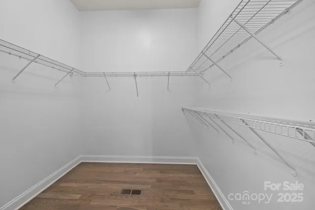 a view of a room with racks on the wall