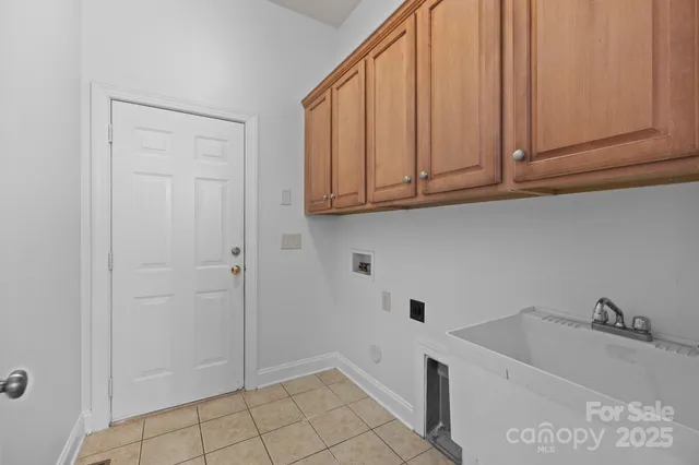 a bathroom with a sink and cabinets