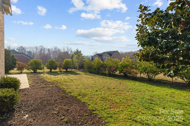 a view of a yard with an outdoor space