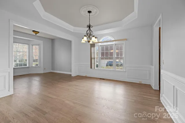 a view of livingroom with window and hardwood floor