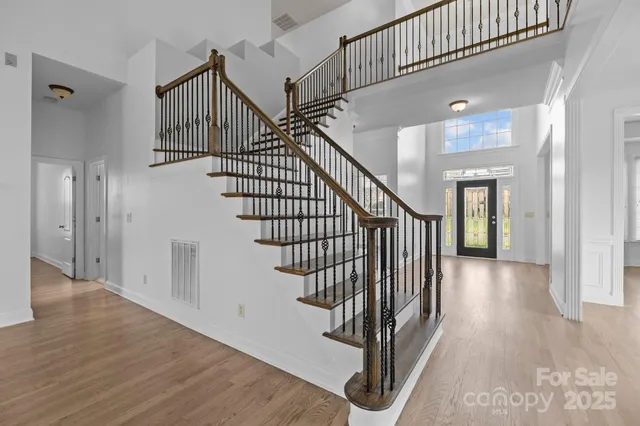 a view of entryway with wooden floor
