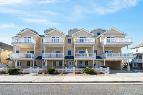 a front view of a building with windows
