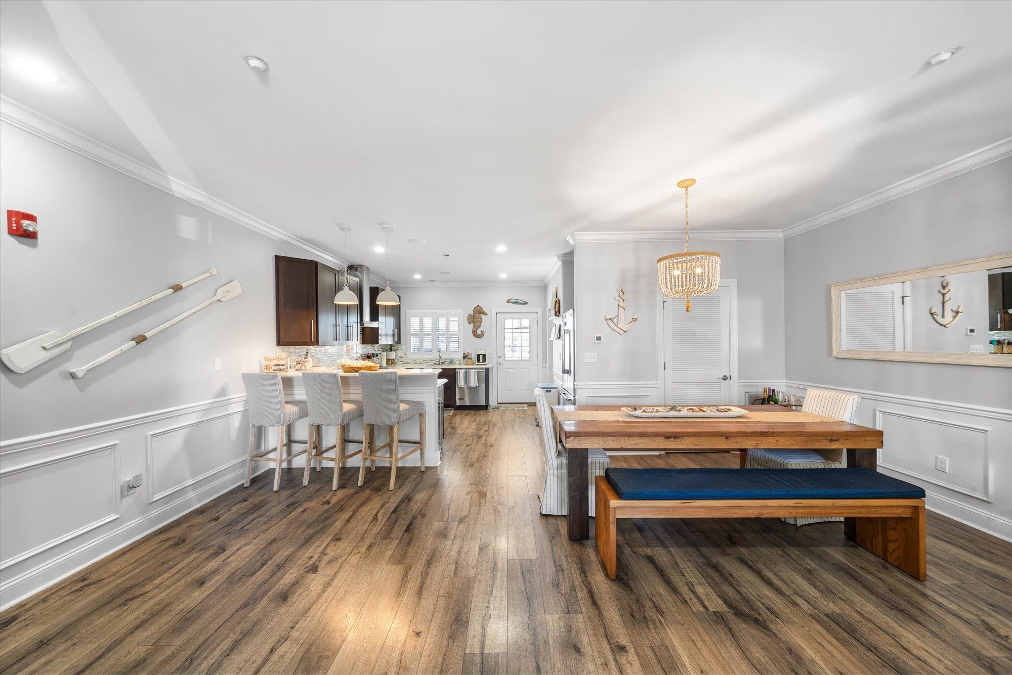 110 West Walnut Avenue, Unit 103 North Wildwood, NJ 08260 - Photo 19 of 44 a outdoor space with lots of furniture a sink and stainless steel appliances