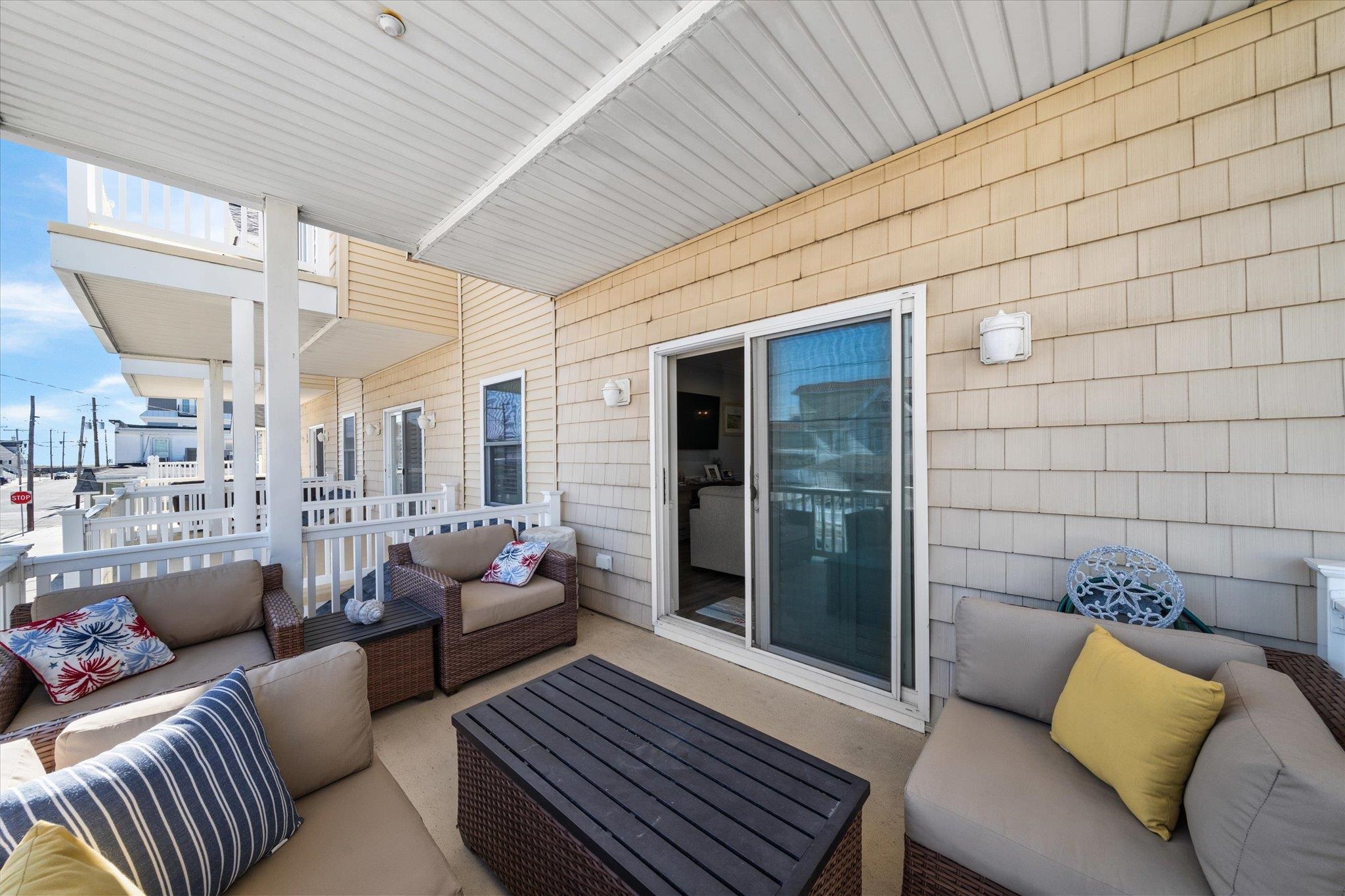 110 West Walnut Avenue, Unit 103 North Wildwood, NJ 08260 - Photo 24 of 44 a living room with furniture and a rug