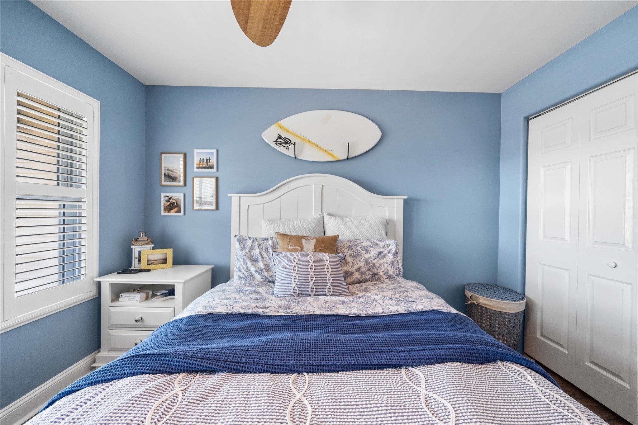 110 West Walnut Avenue, Unit 103 North Wildwood, NJ 08260 - Photo 28 of 44 a bedroom with a bed and a window