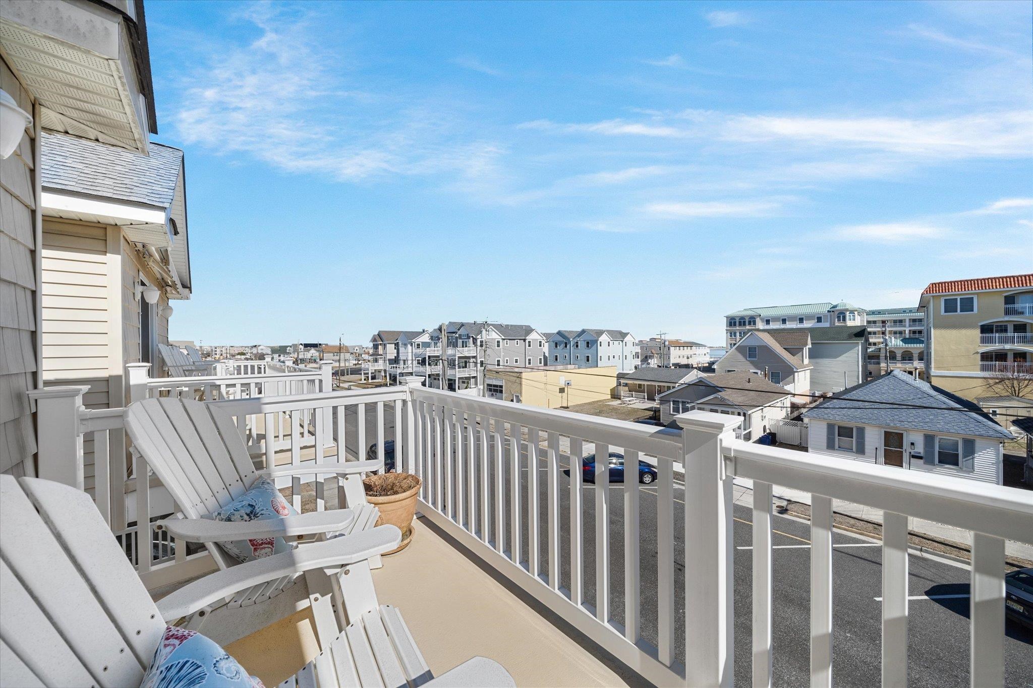 110 West Walnut Avenue, Unit 103 North Wildwood, NJ 08260 - Photo 35 of 44 a view of a balcony with furniture