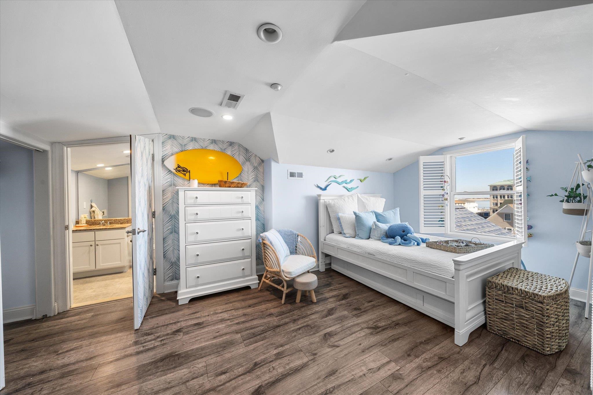 110 West Walnut Avenue, Unit 103 North Wildwood, NJ 08260 - Photo 38 of 44 a living room with furniture and wooden floor