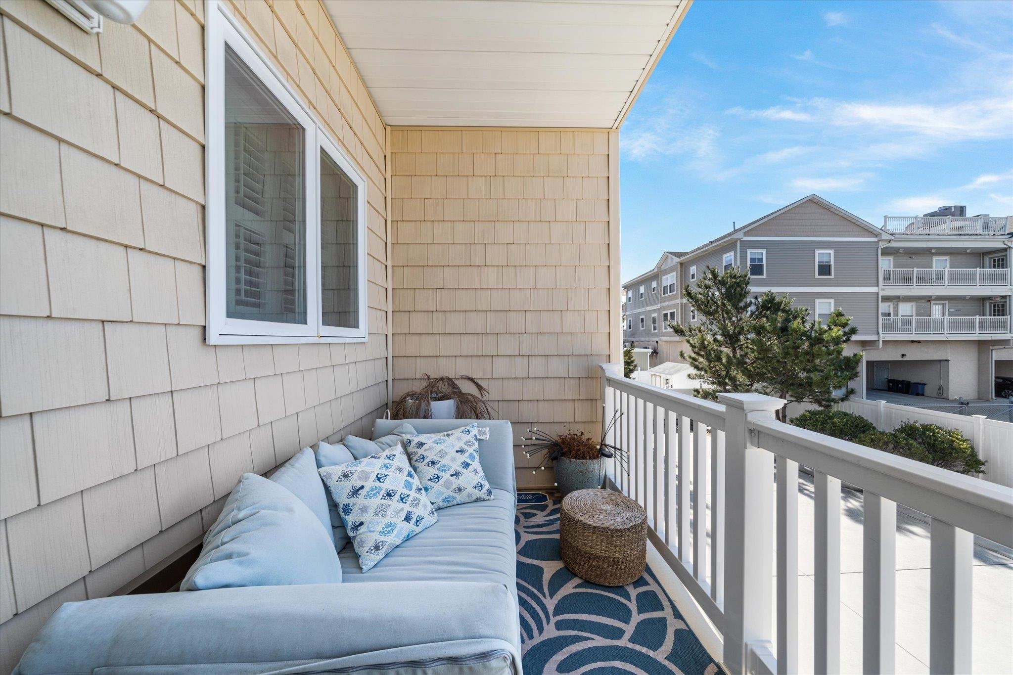 110 West Walnut Avenue, Unit 103 North Wildwood, NJ 08260 - Photo 41 of 44 a view of a porch with furniture