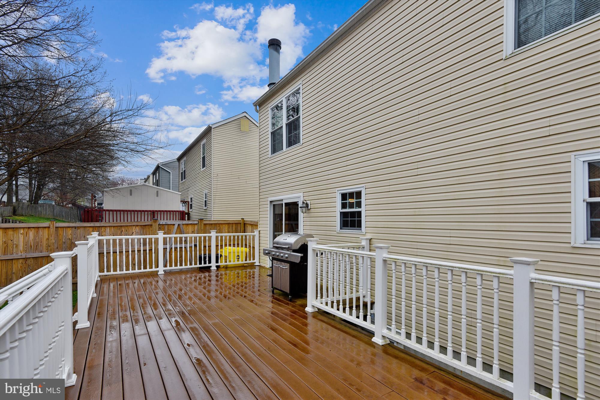 3444 Brookhaven Road Pasadena, MD 21122 - Photo 12 of 50 The large deck spans the width of the house