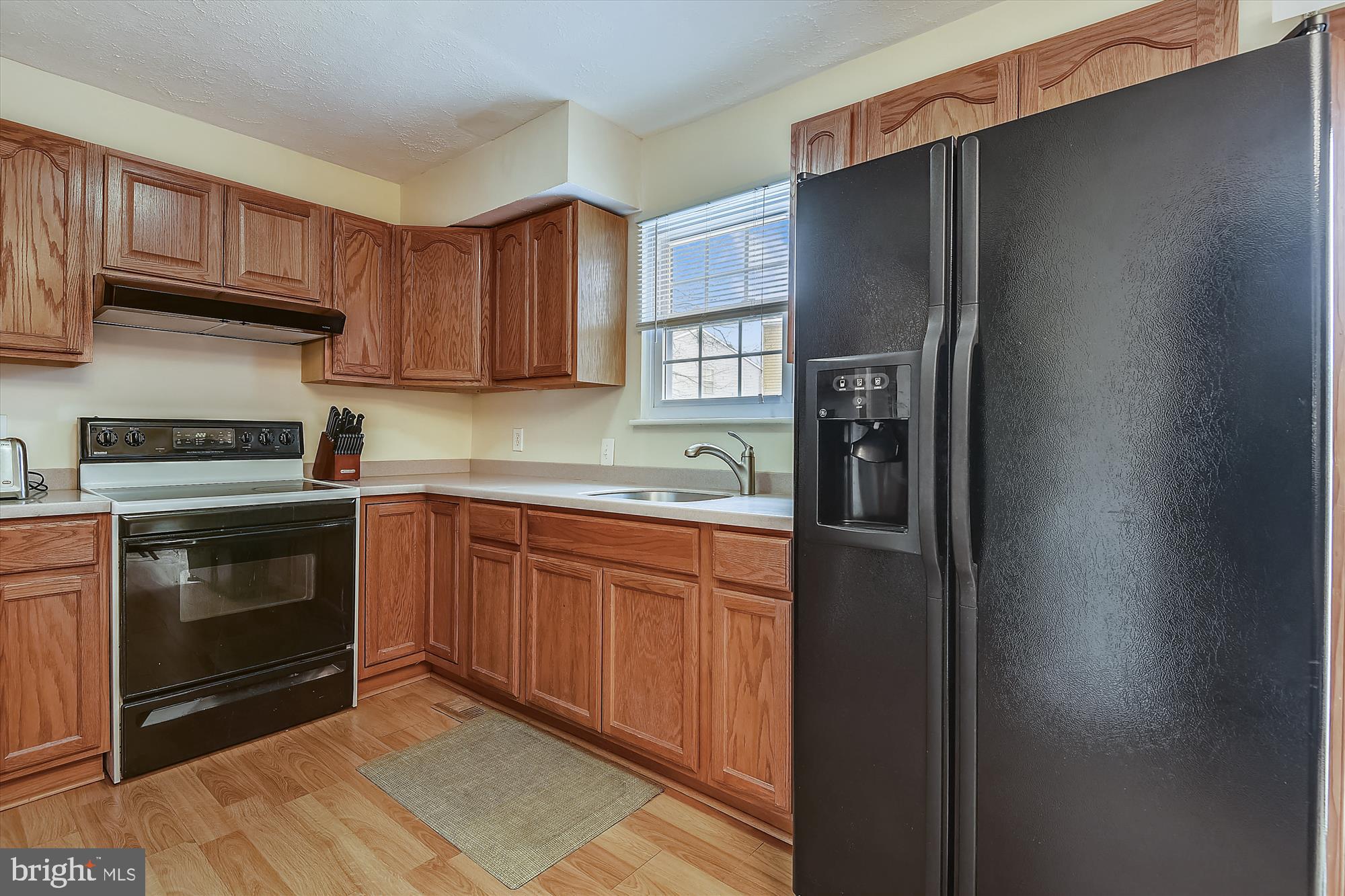 3444 Brookhaven Road Pasadena, MD 21122 - Photo 4 of 50 Kitchen overlooking backyard and deck