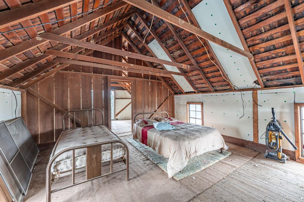 14459 County Road 107 Mingus, TX 76463 - Photo 12 of 40 a bed room with a bed