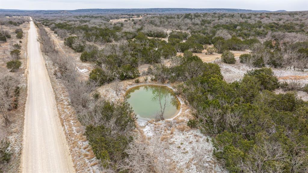 14459 County Road 107 Mingus, TX 76463 - Photo 17 of 40 an aerial view of a house with a yard