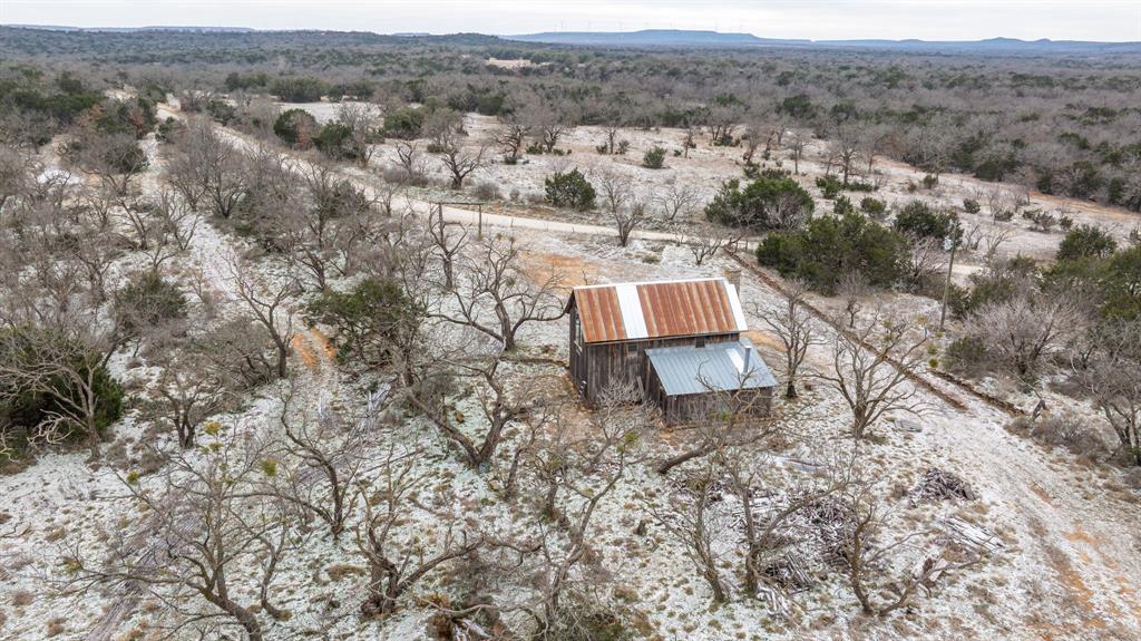 14459 County Road 107 Mingus, TX 76463 - Photo 21 of 40 an aerial view of a house with a yard