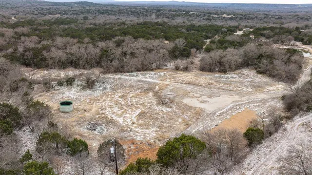 a view of a lake from a mountain