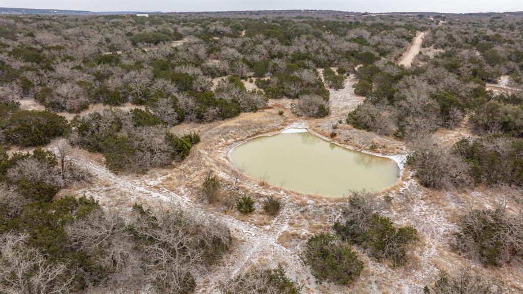 14459 County Road 107 Mingus, TX 76463 - Photo 29 of 40 an aerial view of a house with a yard
