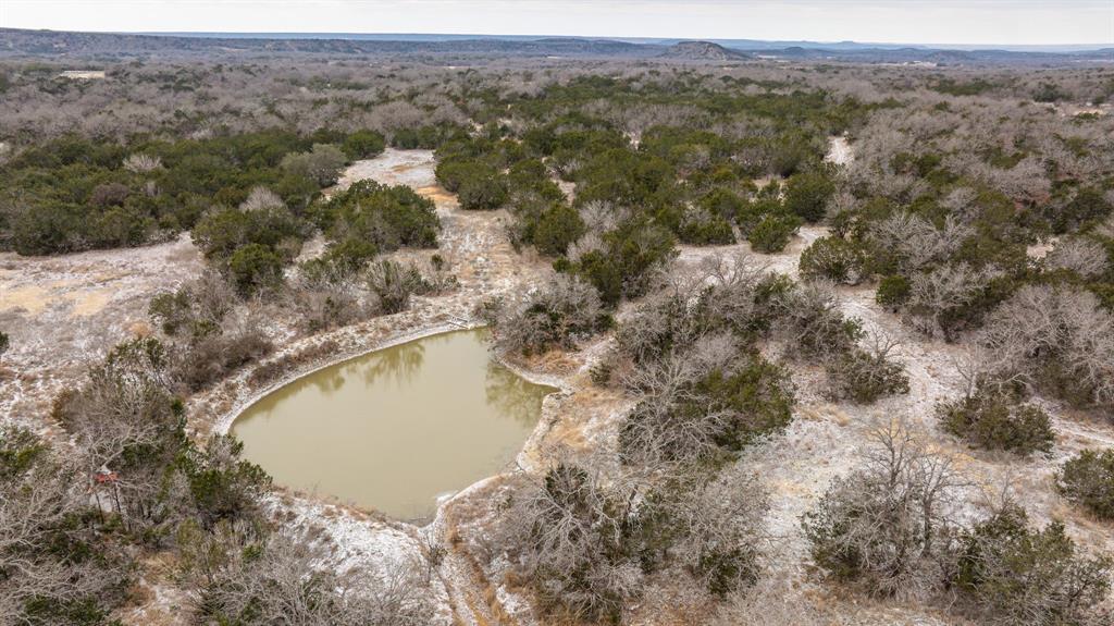 14459 County Road 107 Mingus, TX 76463 - Photo 30 of 40 an aerial view of a house with a mountain