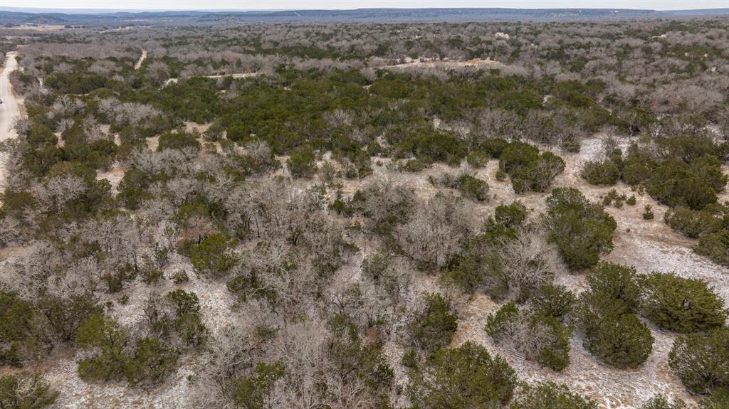 14459 County Road 107 Mingus, TX 76463 - Photo 31 of 40 an aerial view of residential houses with outdoor space and trees