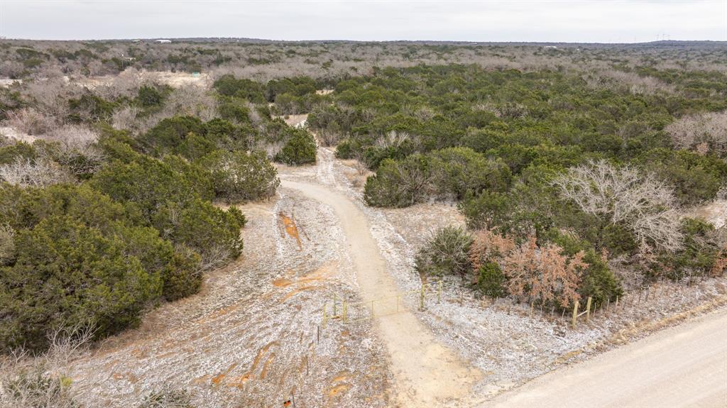 14459 County Road 107 Mingus, TX 76463 - Photo 35 of 40 a view of a yard with a mountain