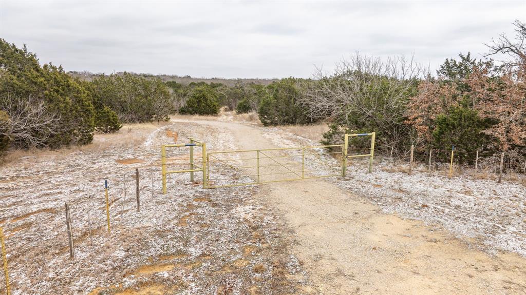 14459 County Road 107 Mingus, TX 76463 - Photo 36 of 40 a view of white house with a yard