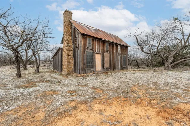 a view of a yard covered with snow