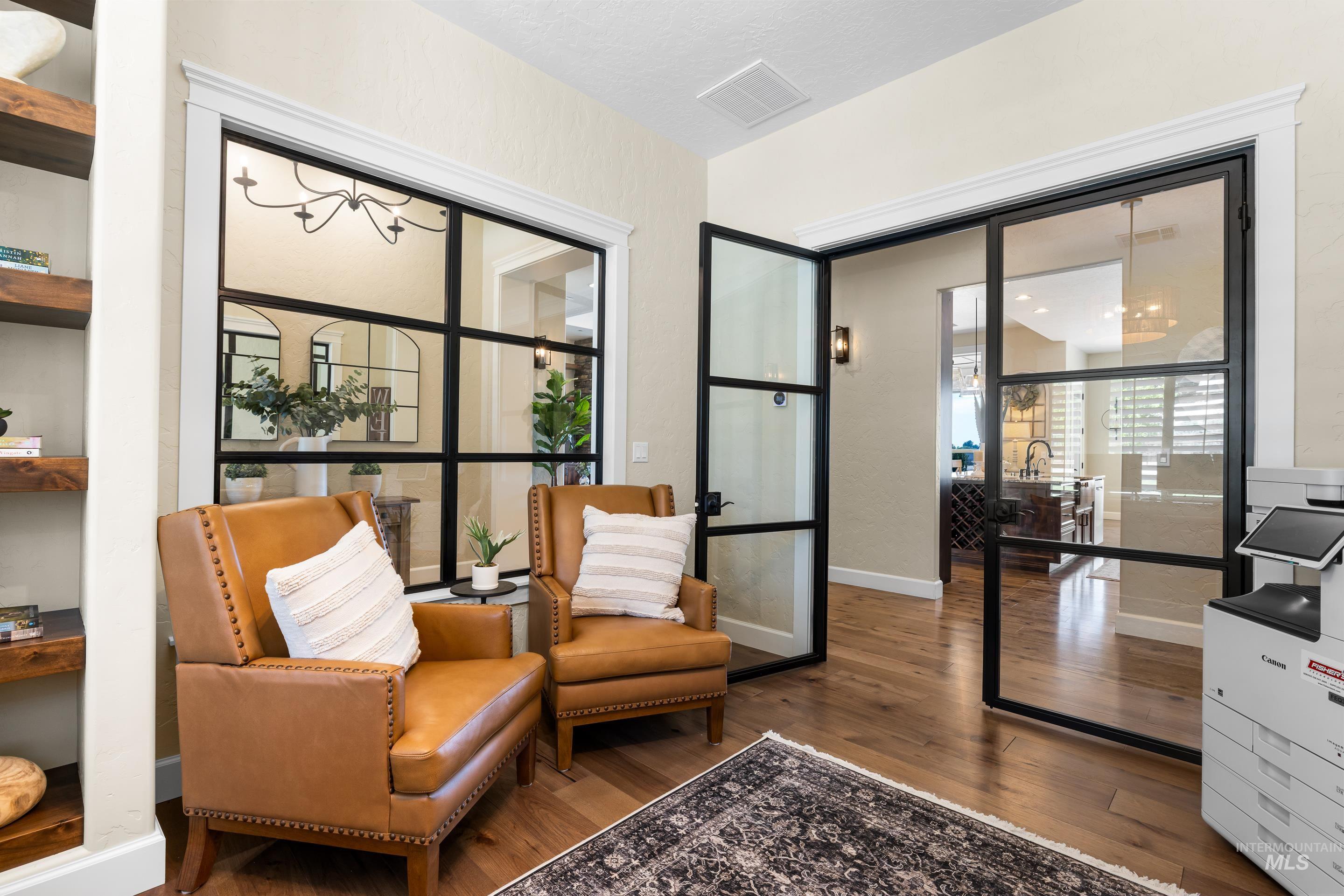 9819 Foothill Road Middleton, ID 83644 - Photo 14 of 49 Sitting room featuring wood finished floors and baseboards