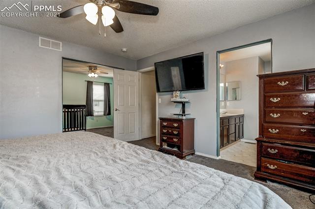 Spacious master with views of the ensuite bath and bonus room