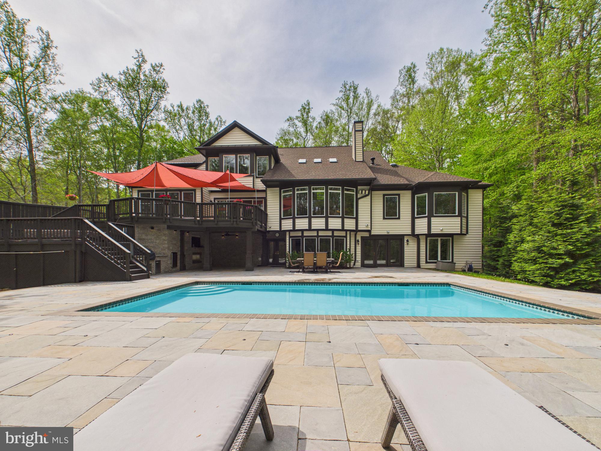 7972 Pinnacle Ridge Drive Manassas, VA 20112 - Photo 2 of 50 Serene retreat with poolside charm.