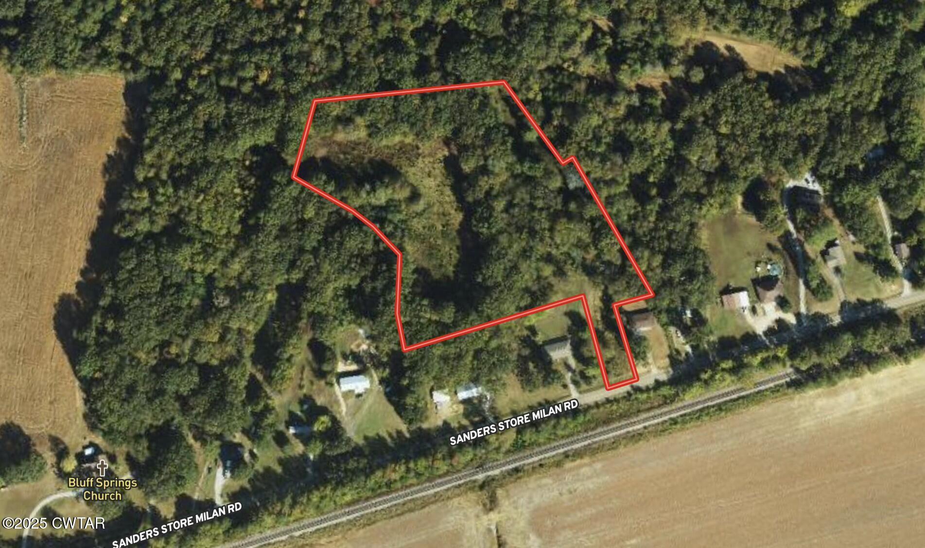 0 Sanders Store Road Milan, TN 38358 - Photo 14 of 20 a view of a small yard and a wooden deck