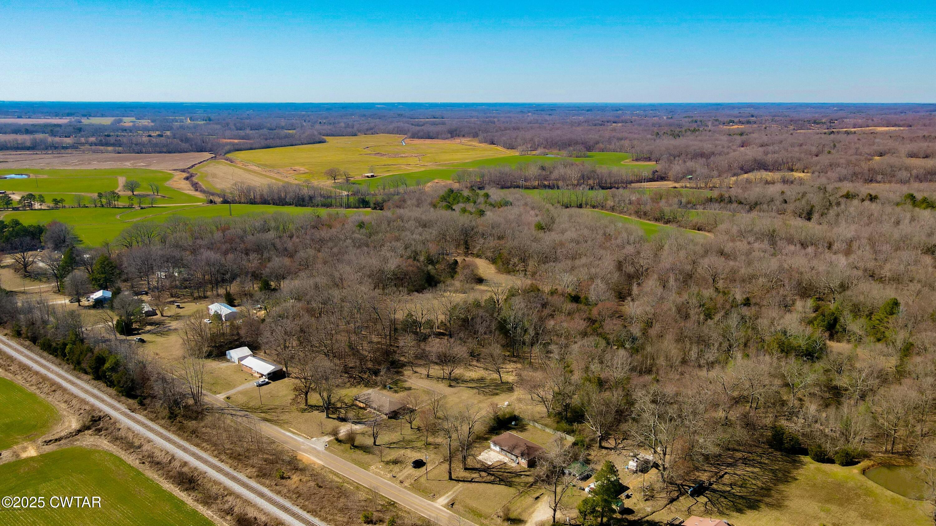 0 Sanders Store Road Milan, TN 38358 - Photo 15 of 20 a view of a city with mountains in the background