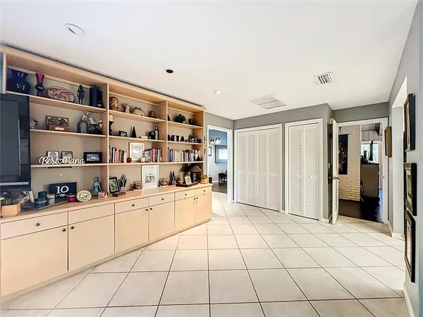 a kitchen with stainless steel appliances a sink and cabinets