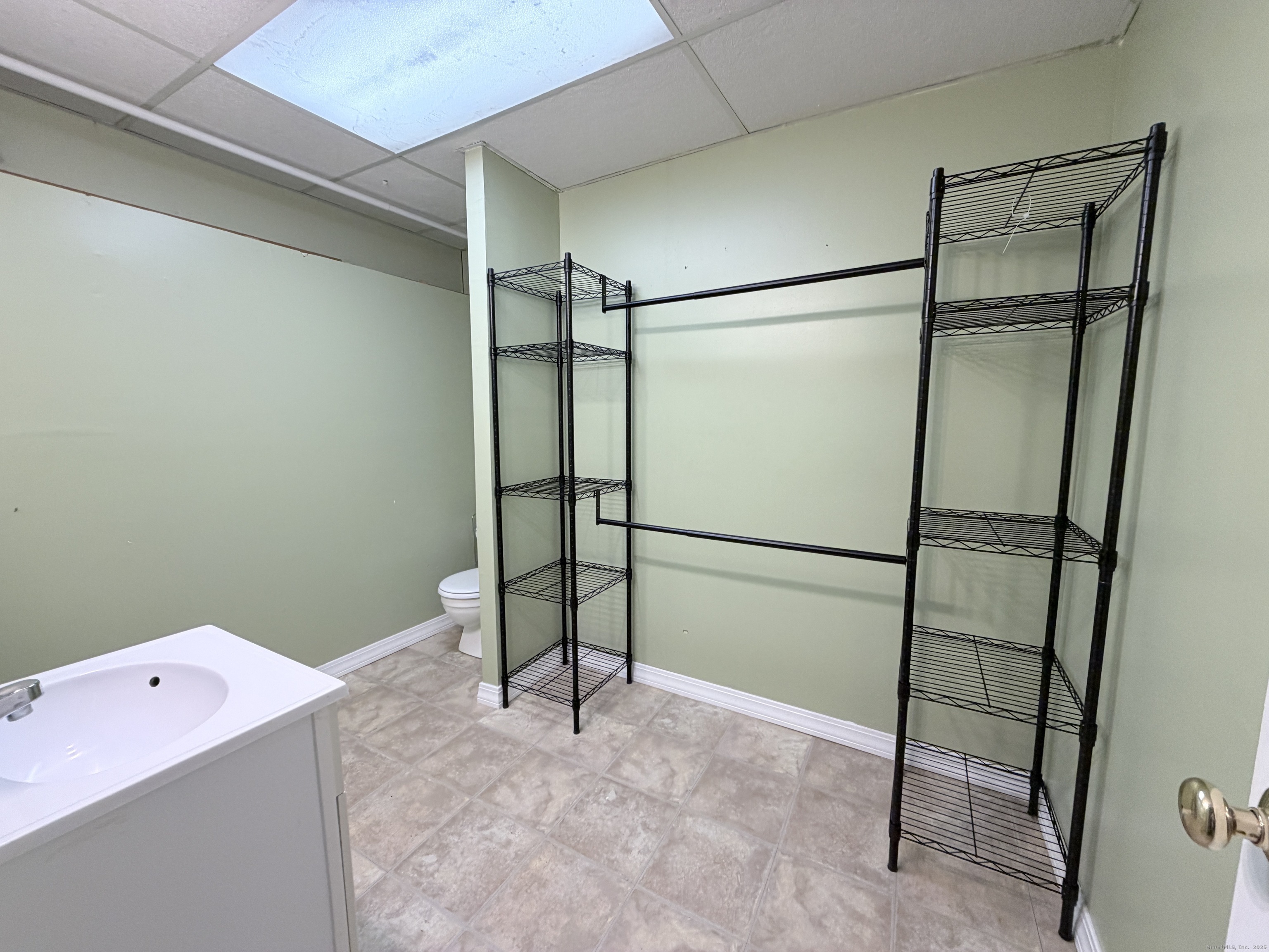 105 Spring Lane, Unit 105 Suffield, CT 06078 - Photo 12 of 16 a bathroom with a shower