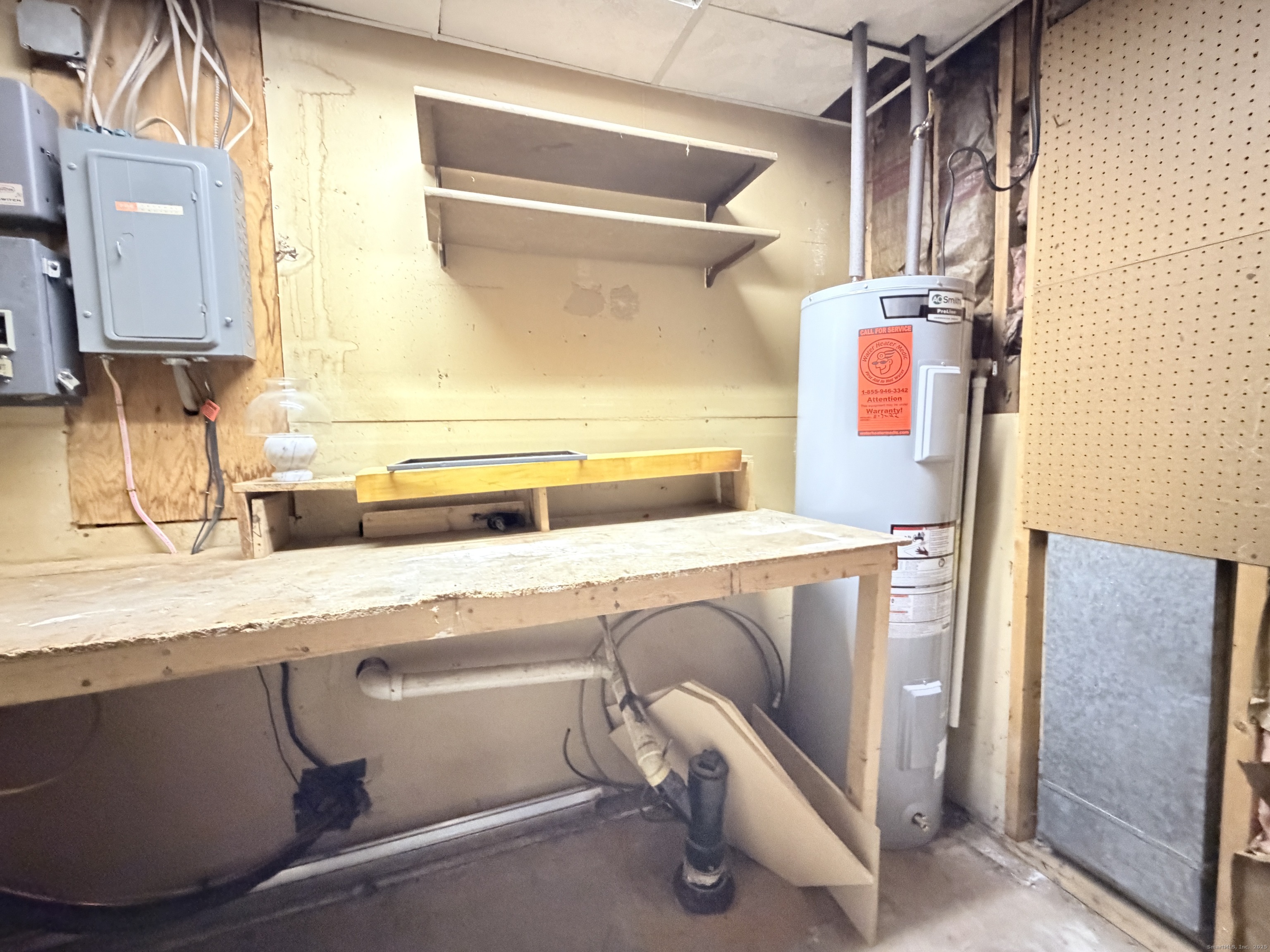 105 Spring Lane, Unit 105 Suffield, CT 06078 - Photo 13 of 16 a utility room with dryer and washer