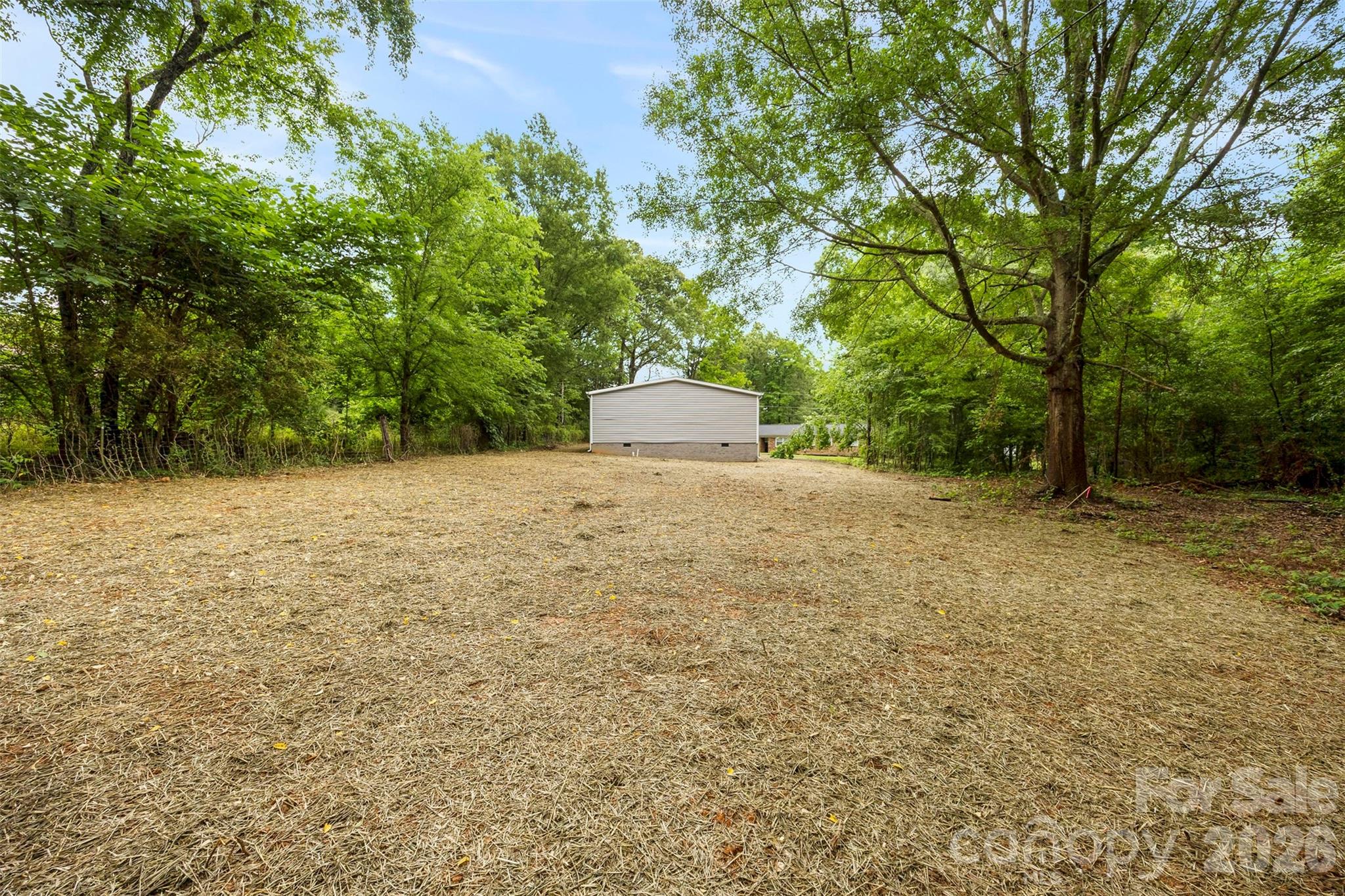 321 Bell Road Kings Mountain, NC 28086 - Photo 26 of 32 a view of a yard with trees
