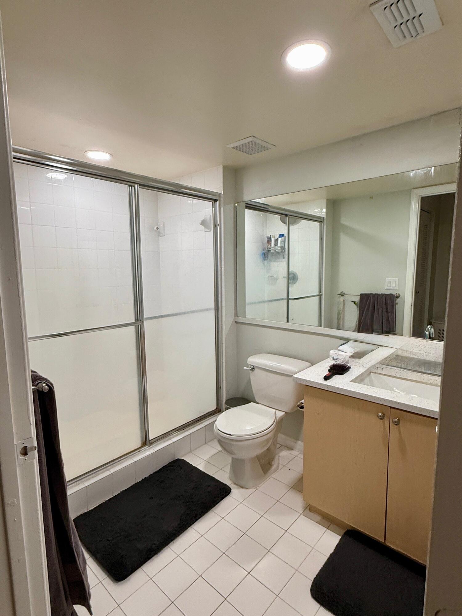 3690 Northwest Mediterranean Lane, Unit 305 Jensen Beach, FL 34957 - Photo 6 of 12 Portofino primary bath