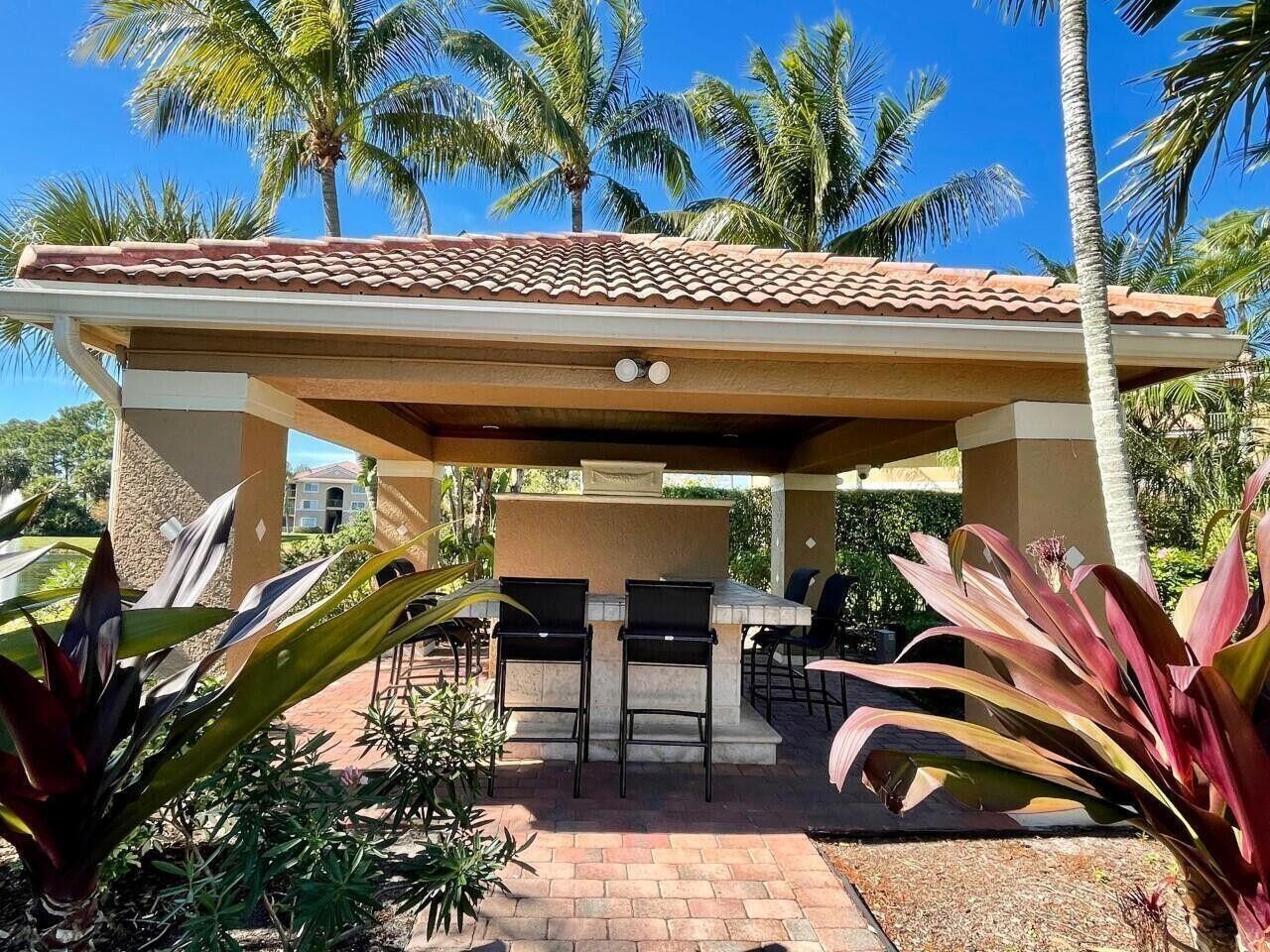 3690 Northwest Mediterranean Lane, Unit 305 Jensen Beach, FL 34957 - Photo 10 of 12 Portofino bar area