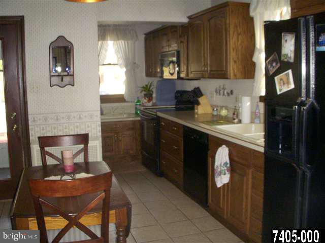 1841 Jefferson Road Spring Grove, PA 17362 - Photo 4 of 16 a kitchen with a sink cabinets and window